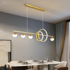 Gold ring and globe linear LED chandelier, lit