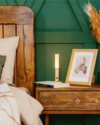 Wren battery operated wooden wall sconce with warm LED light