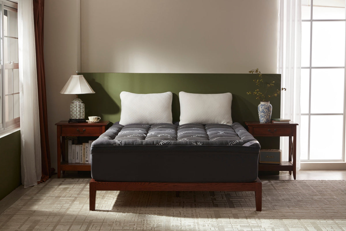 4 inch cooling mattress topper with bamboo pillow top fitted over a mattress