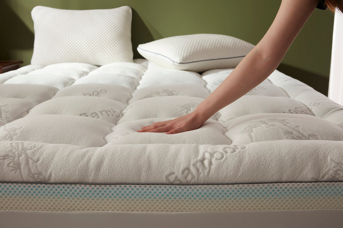 Stitched edge and bamboo fabric detail of the mattress topper