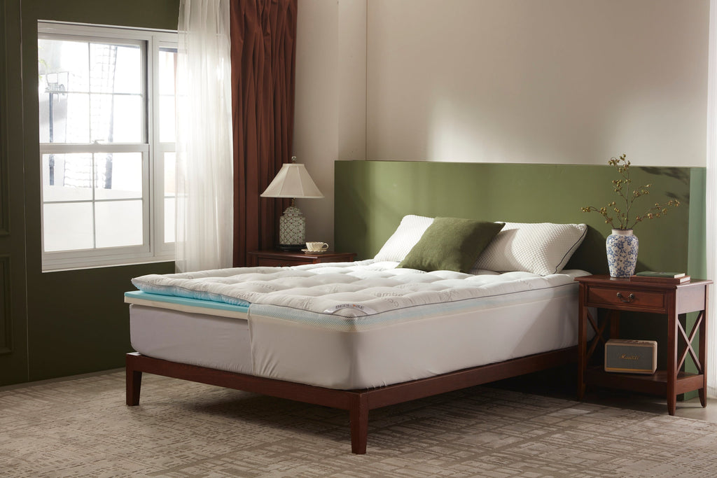 Deep pocket stretch skirt holding the topper on a thick mattress