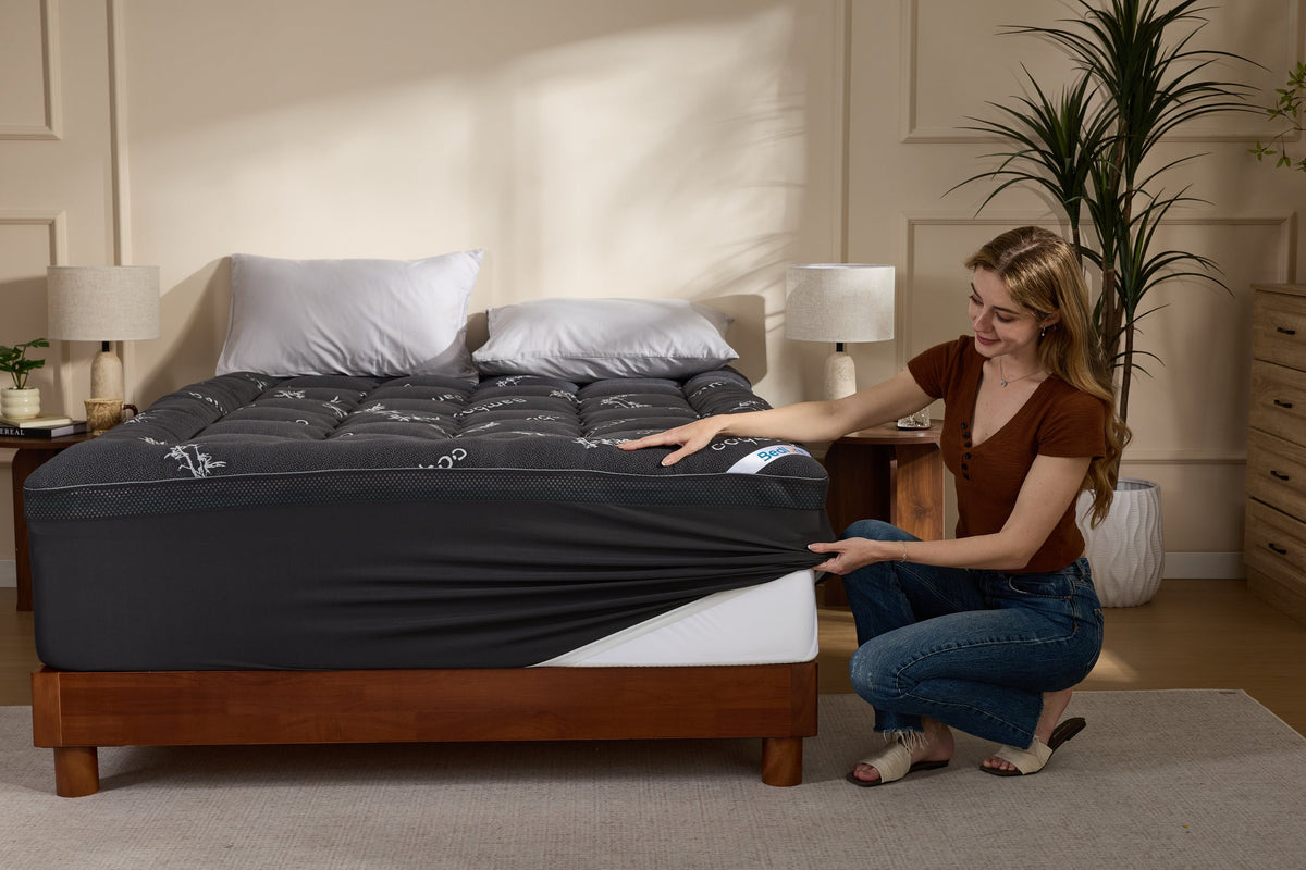 Cooling mattress topper on a bed in a bedroom setting