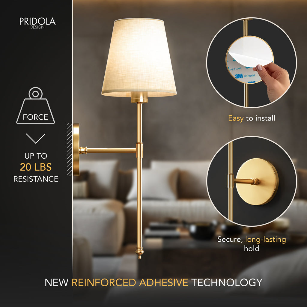 Wireless wall sconce lit in a dark room with warm light