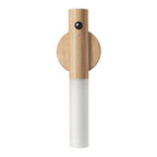 Wren motion-activated wall sconce, warm light at night