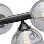 Orbit 16-light linear chandelier in matte black with smoky gray bubble glass, by Open House